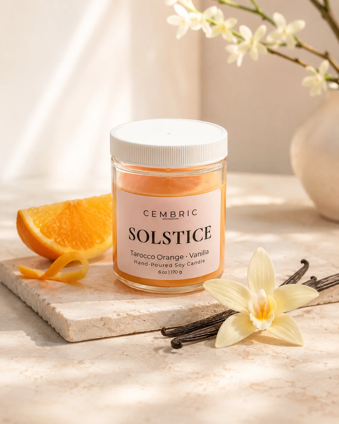 SOLSTICE candle styled with tarocco orange and vanilla details